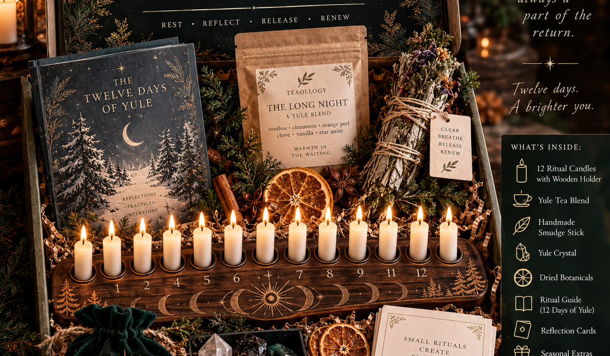 Yule Ritual Box with twelve candles, wooden candle holder, seasonal tea blend, smudge stick, crystal, dried botanicals, and ritual guide